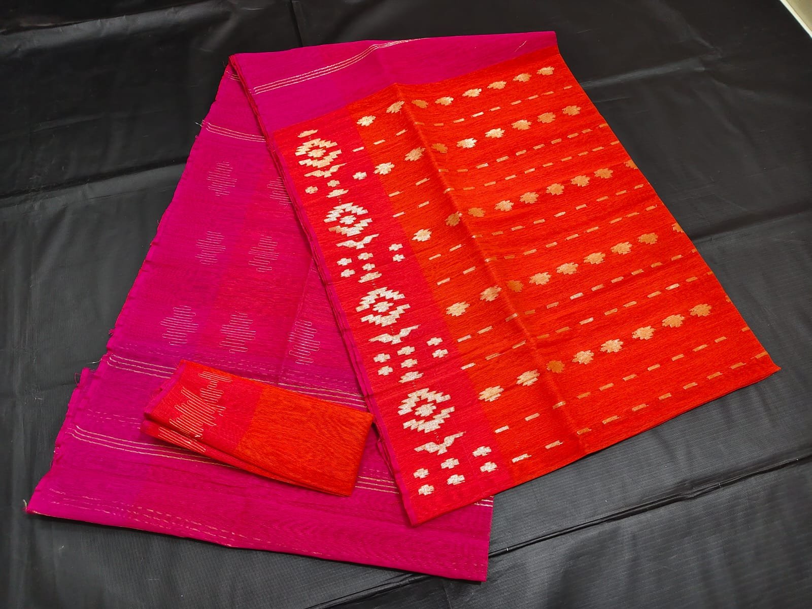 Orange jamdani saree with blouse piece